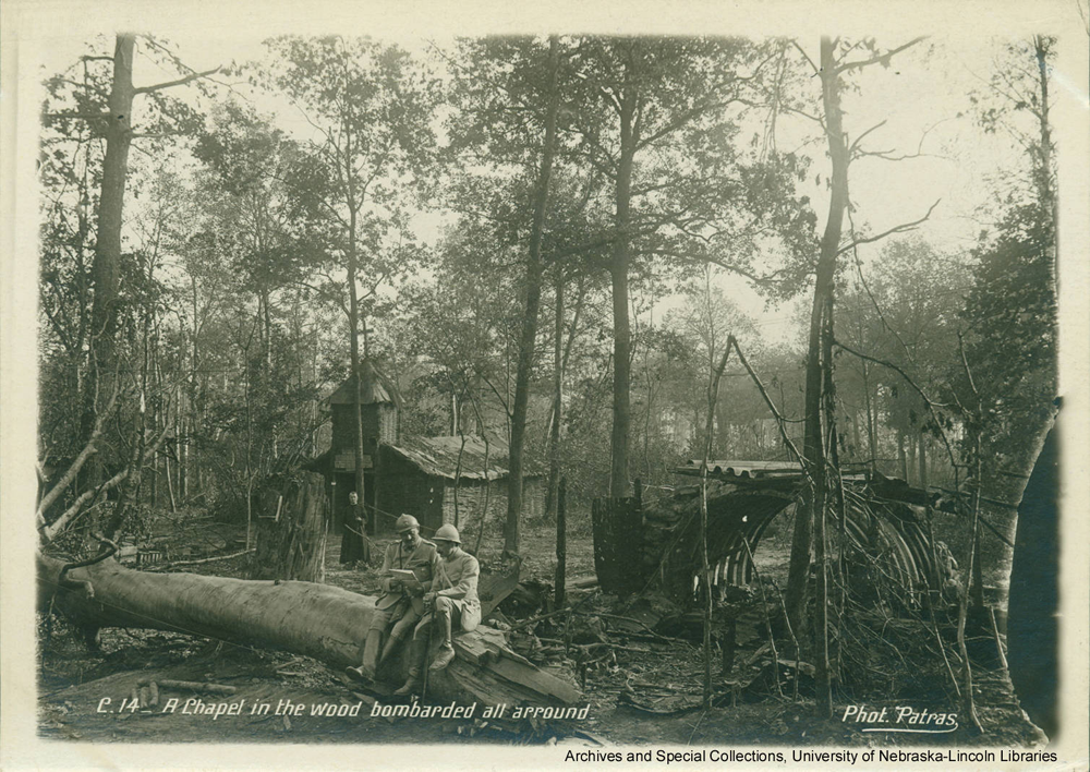 Soldiers and chaplain at outdoor chapel in Beaumarais